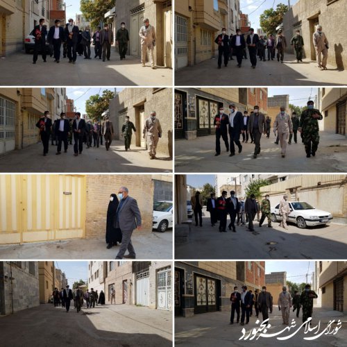 پیاده روی ریاست و اعضای شورای اسلامی شهر، و سرپرست شهرداری بجنورد تا منزل مادر شهید صالحی
